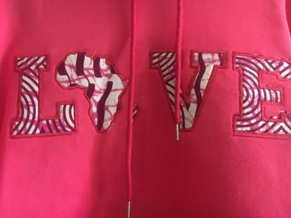 "LOVE Africa" Ankara Appliqué Hoodie – Pink (Fleece-Lined) “LOVE Africa” Ankara Appliqué Hoodie – Hot Pink