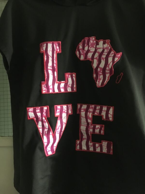 IMG_0329 "LOVE Africa" Ankara Appliqué Hooded T-Shirt With Curved Hem – Black